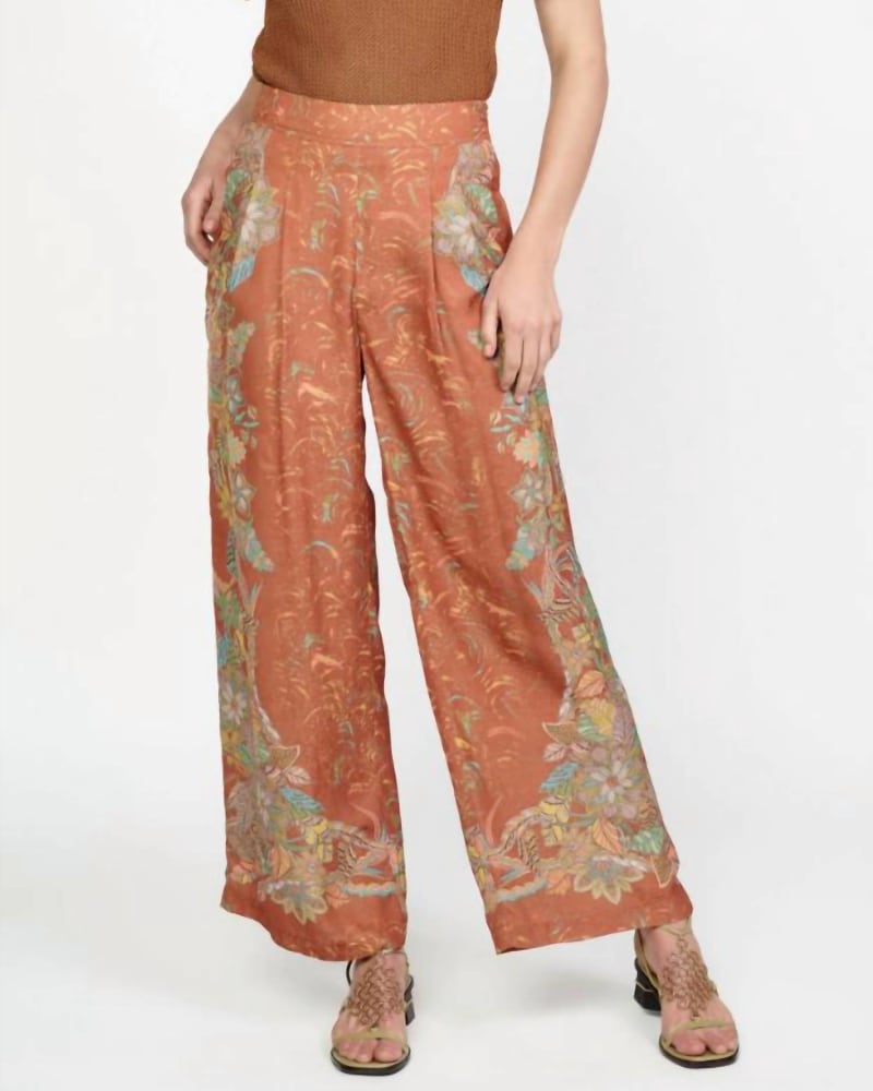 Front of a model wearing a size L Printed Wide Leg Pant In Brown Multi in Brown Multi by current air. | dia_product_style_image_id:358956